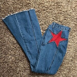 Trendy Blue Flare Jeans with Red Star Detail